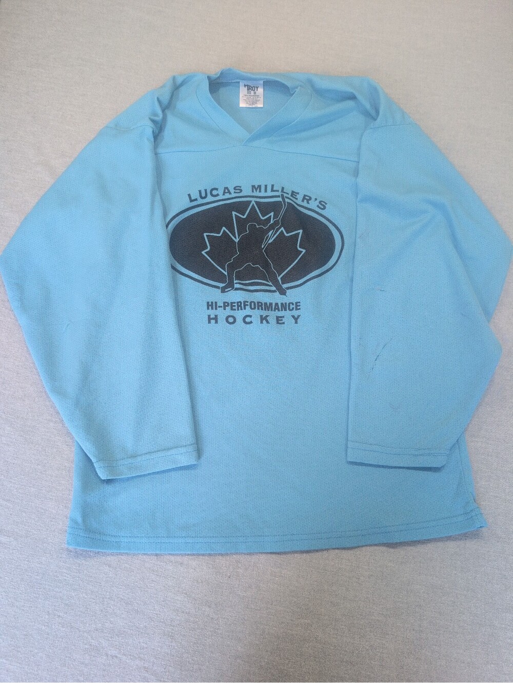 Lucas Miller's Hi-Performance Hockey blue long sleeve shirt size M